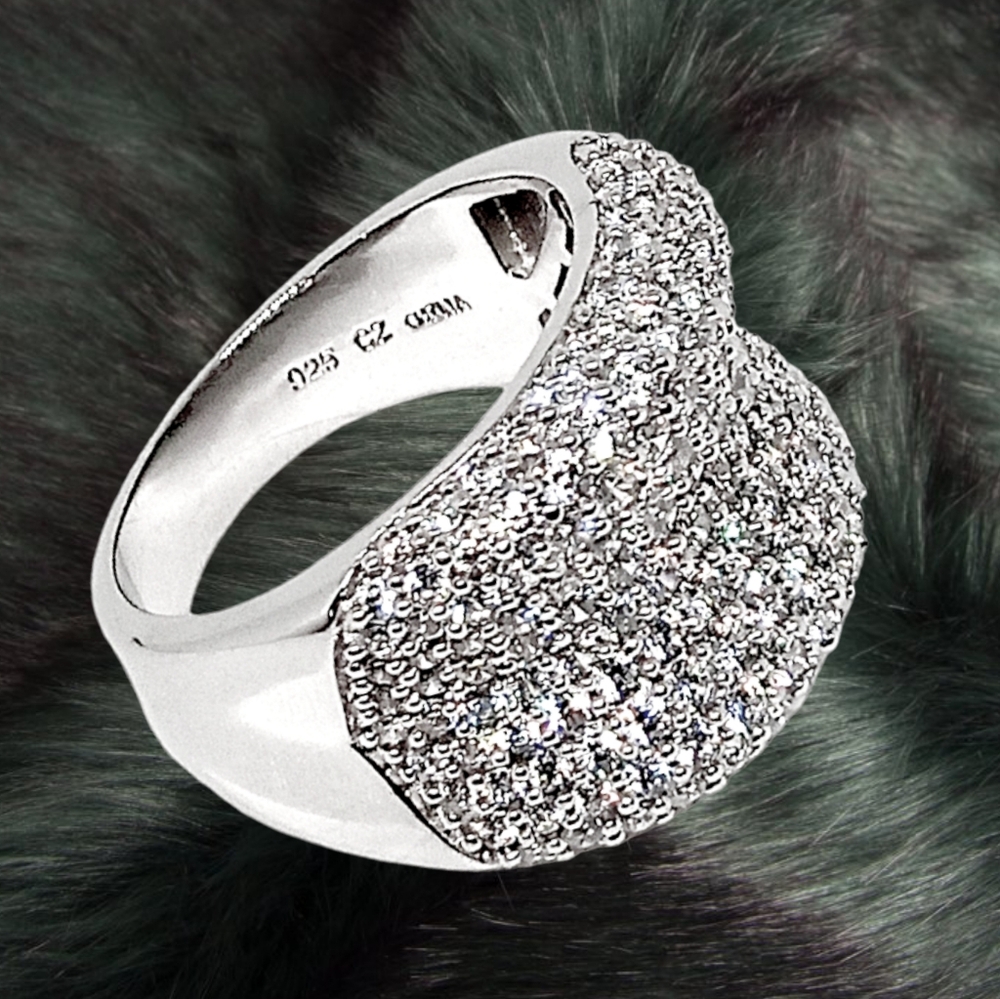 IMENA Sterling Silver with Shinny CZ Stones.